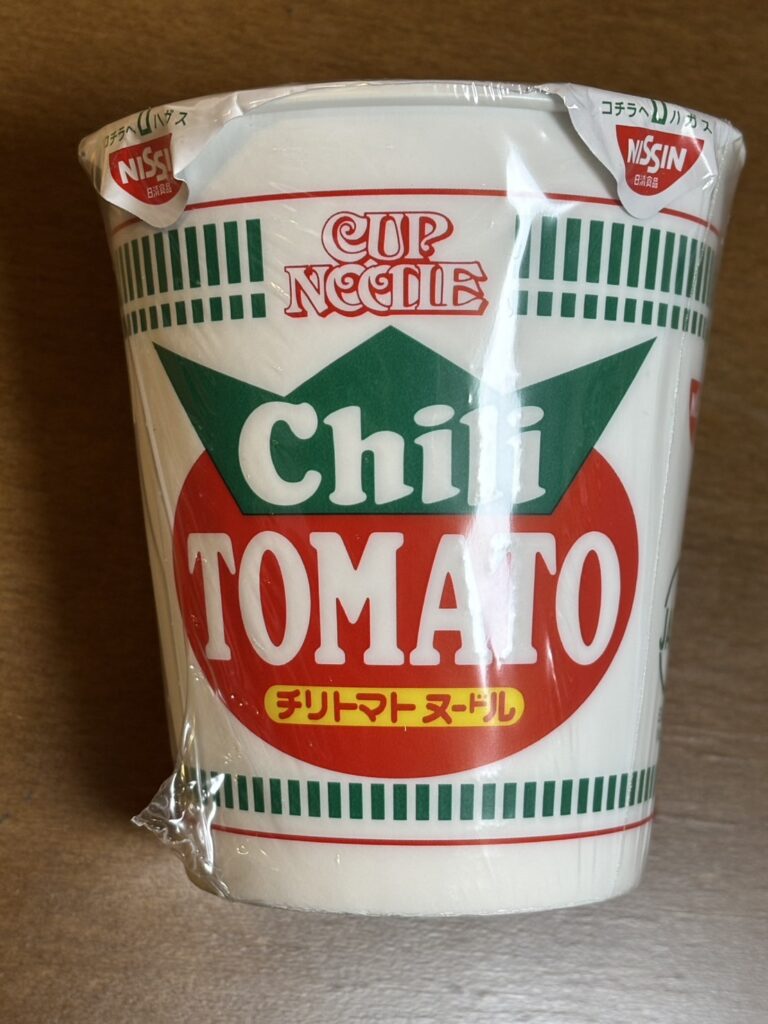 Spicy chili tomato cup noodle with tangy and rich soup – maanghang pero masarap, perfect for rainy days.