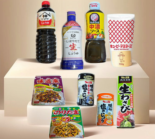 Japanese seasonings and sauces — Kewpie mayonnaise, soy sauce, Bull-Dog sauce, and wasabi