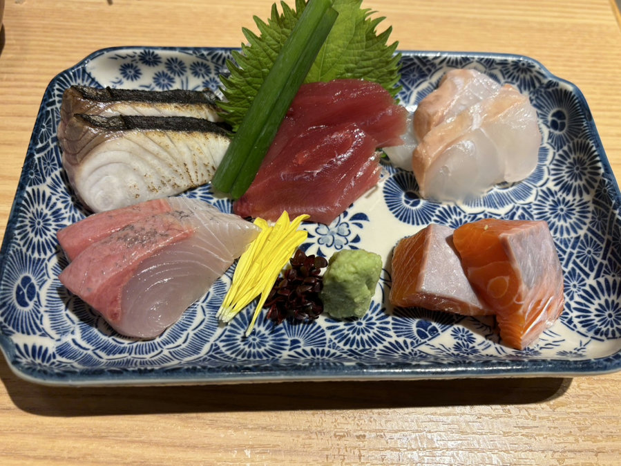 Assorted sashimi platter at Sushi & Oden Ninoya in Hamamatsucho Tokyo, including tuna, salmon, yellowtail and more.