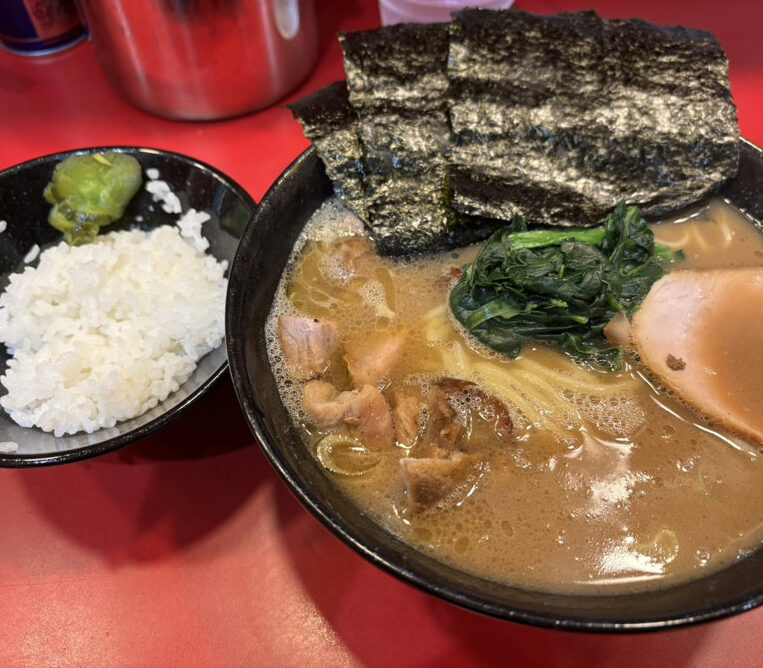 Iekei ramen at Taniseya in Shimbashi Tokyo with chashu pork, seaweed, spinach, and rice on the side