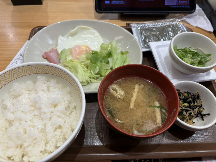 My Meals breakfast at Sukiya in Japan featuring the Natto Bacon and Egg Set Meal with rice, miso soup.