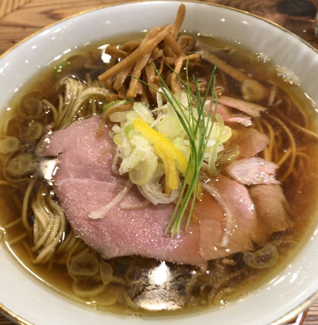 A bowl of seafood-based shoyu ramen served at Kaneda in KITTE Marunouchi near Tokyo Station.