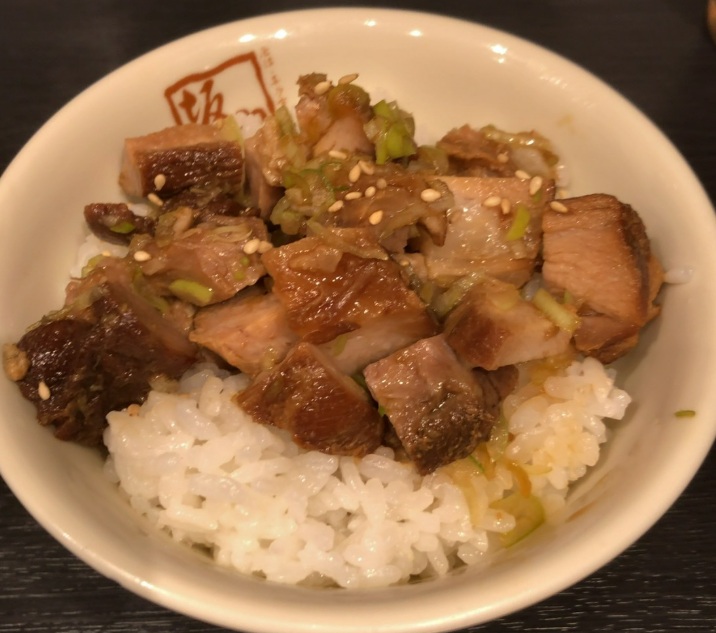 A wasabi soy sauce chashu rice bowl served at Kitakata Ramen Bannai Uchisaiwaicho in Tokyo.
