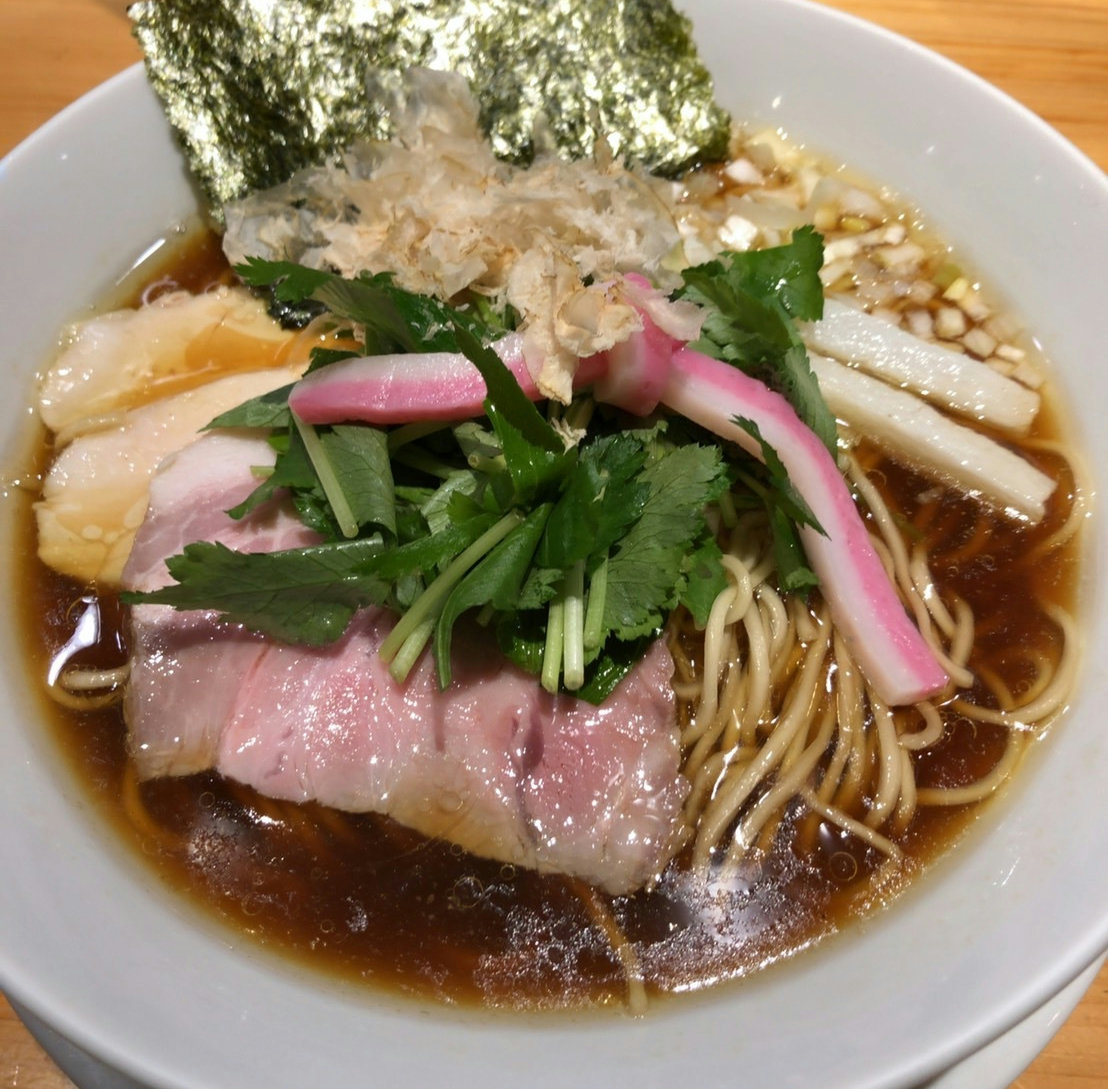 A bowl of shoyu ramen with seafood and shellfish broth served at Mugi to Olive in Ginza, Tokyo.