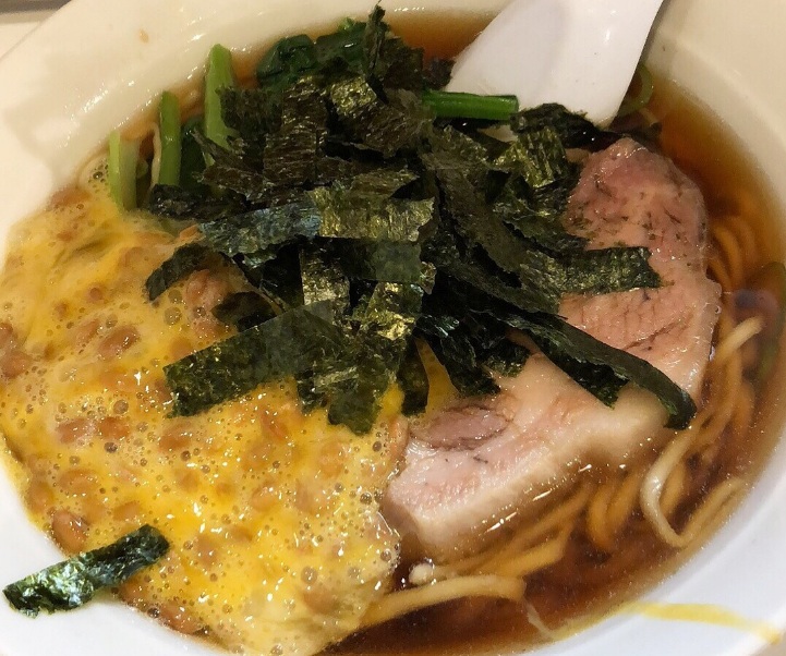 A bowl of natto ramen topped with fermented soybeans served at Ramen Horiuchi Shimbashi in Tokyo.
