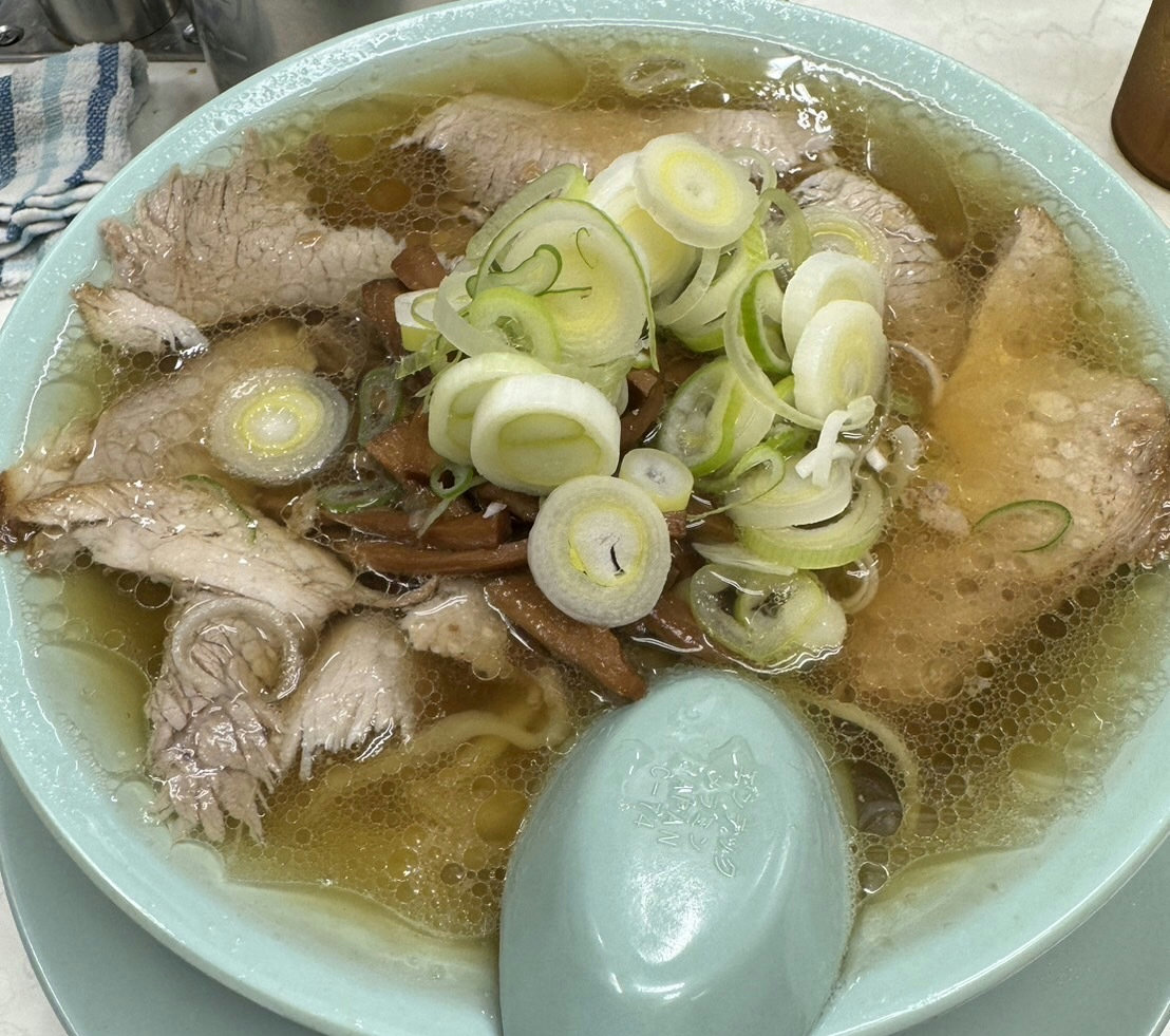 A bowl of pork-based shoyu chuka soba served at New Tomochin in Shimbashi, Tokyo.