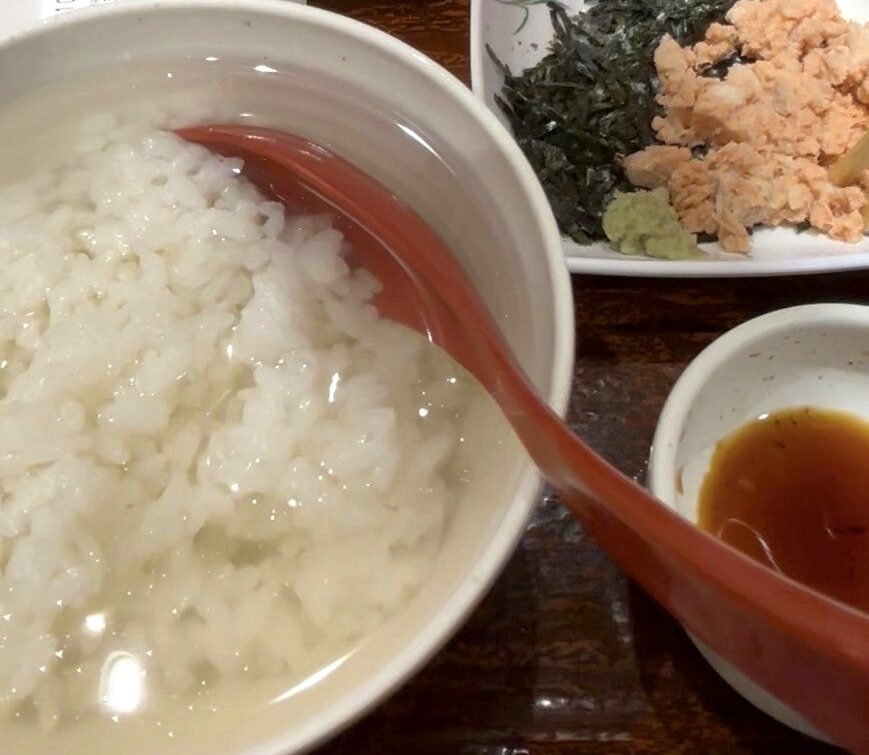 Yayoi Ken Mini Sukiyaki Breakfast served with rice, flaked salmon, nori, and side dishes.